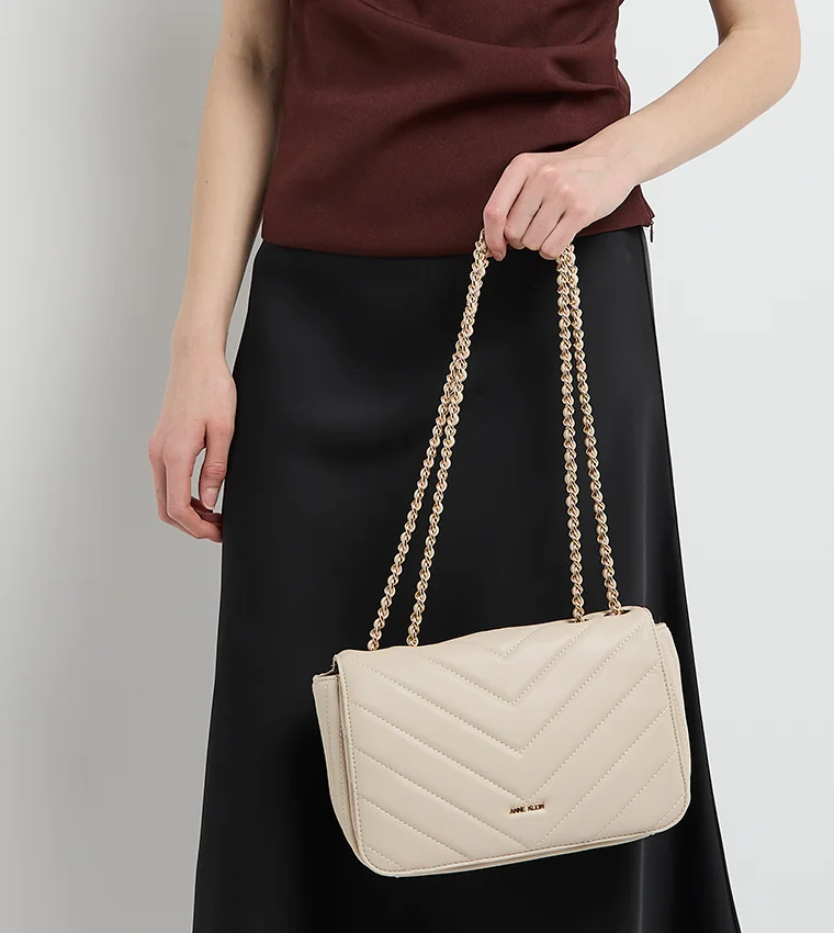 آن كلاين حقيبة كروس بودي قابلة للتحويل من آن كلاين بتفاصيل شعار مبطنة